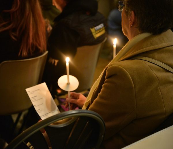 Light Up A Life 2023 Person holding a candle