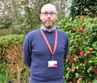 Will Hood Cornwall Hospice Care Finance Director outside in the gardens at Mount Edgcumbe Hospice