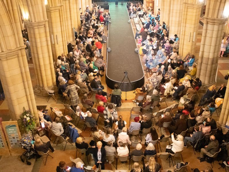 Looking down on the catwalk and audience at the sustainable fashion show